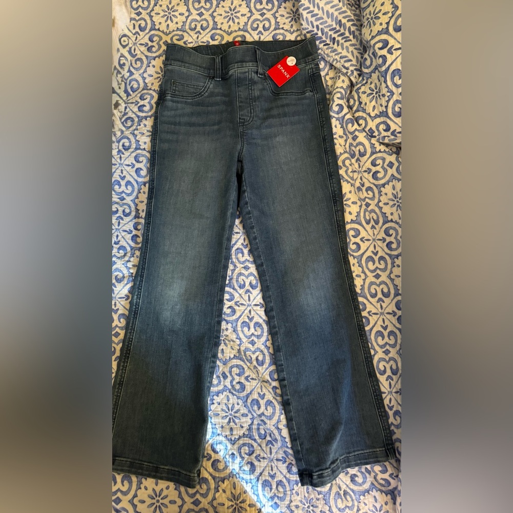 Very flattering! SPANX Vintage Indigo wide leg jean New with tags!
